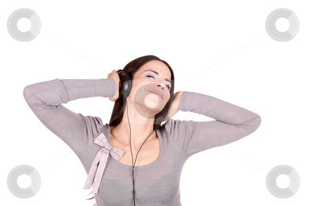 To use this stock image in your creative project, please select the size you need over to the right and click the "Add to Cart" button.
Your downloaded image will come with the Cutcaster watermark removed so don’t worry about the watermark you see on this page. Listening to Music stock photo, Beautiful young woman Listening to Music by Remy Musser