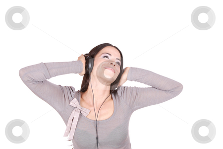 To use this stock image in your creative project, please select the size you need over to the right and click the "Add to Cart" button.
Your downloaded image will come with the Cutcaster watermark removed so don’t worry about the watermark you see on this page. Listening to Music stock photo, Beautiful young woman Listening to Music by Remy Musser