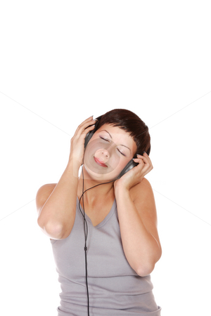 To use this stock image in your creative project, please select the size you need over to the right and click the "Add to Cart" button.
Your downloaded image will come with the Cutcaster watermark removed so don’t worry about the watermark you see on this page. Listening to Music stock photo, Beautiful young woman Listening to Music by Remy Musser