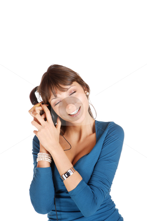 To use this stock image in your creative project, please select the size you need over to the right and click the "Add to Cart" button.
Your downloaded image will come with the Cutcaster watermark removed so don’t worry about the watermark you see on this page. Listening to Music stock photo, Beautiful young woman Listening to Music by Remy Musser