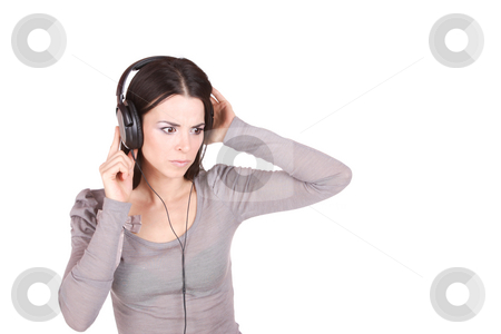To use this stock image in your creative project, please select the size you need over to the right and click the "Add to Cart" button.
Your downloaded image will come with the Cutcaster watermark removed so don’t worry about the watermark you see on this page. Listening to Music stock photo, Beautiful young woman Listening to Music by Remy Musser