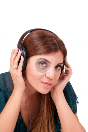 To use this stock image in your creative project, please select the size you need over to the right and click the "Add to Cart" button.
Your downloaded image will come with the Cutcaster watermark removed so don’t worry about the watermark you see on this page. Listening to Music stock photo, Beautiful young woman Listening to Music by Remy Musser