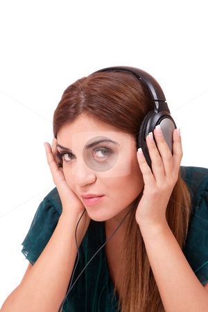 To use this stock image in your creative project, please select the size you need over to the right and click the "Add to Cart" button.
Your downloaded image will come with the Cutcaster watermark removed so don’t worry about the watermark you see on this page. Listening to Music stock photo, Beautiful young woman Listening to Music by Remy Musser