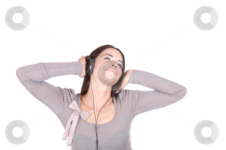 To use this stock image in your creative project, please select the size you need over to the right and click the "Add to Cart" button.
Your downloaded image will come with the Cutcaster watermark removed so don’t worry about the watermark you see on this page. Listening to Music stock photo, Beautiful young woman Listening to Music by Remy Musser