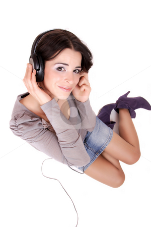 To use this stock image in your creative project, please select the size you need over to the right and click the "Add to Cart" button.
Your downloaded image will come with the Cutcaster watermark removed so don’t worry about the watermark you see on this page. Listening to Music stock photo, Beautiful young woman Listening to Music by Remy Musser