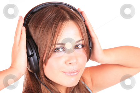 To use this stock image in your creative project, please select the size you need over to the right and click the "Add to Cart" button.
Your downloaded image will come with the Cutcaster watermark removed so don’t worry about the watermark you see on this page. Listening to Music stock photo, Beautiful young woman Listening to Music by Remy Musser