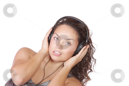 To use this stock image in your creative project, please select the size you need over to the right and click the "Add to Cart" button.
Your downloaded image will come with the Cutcaster watermark removed so don’t worry about the watermark you see on this page. Listening to Music stock photo, Beautiful young woman Listening to Music by Remy Musser