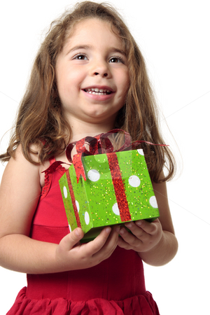 To use this stock image in your creative project, please select the size you need over to the right and click the "Add to Cart" button.
Your downloaded image will come with the Cutcaster watermark removed so don’t worry about the watermark you see on this page. Excited girl holding a present stock photo, Exuberant happy child holding a present. by Leah-Anne Thompson