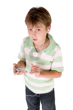 To use this stock image in your creative project, please select the size you need over to the right and click the "Add to Cart" button.
Your downloaded image will come with the Cutcaster watermark removed so don’t worry about the watermark you see on this page. Boy holding mp3 player stock photo, A child dressed in jeans and polo shirt holding an mp3 player. by Leah-Anne Thompson