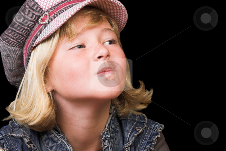 To use this stock image in your creative project, please select the size you need over to the right and click the "Add to Cart" button.
Your downloaded image will come with the Cutcaster watermark removed so don’t worry about the watermark you see on this page. Young Girl stock photo, Young girl wearing a hat, against a black background by Carla Booysen