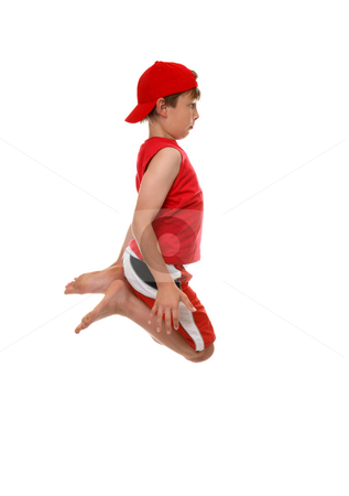 To use this stock image in your creative project, please select the size you need over to the right and click the "Add to Cart" button.
Your downloaded image will come with the Cutcaster watermark removed so don’t worry about the watermark you see on this page. Jumping boy stock photo, A boy jumps into the air, knees in tight by Leah-Anne Thompson