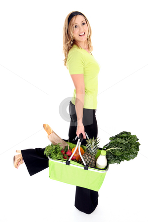 To use this stock image in your creative project, please select the size you need over to the right and click the "Add to Cart" button.
Your downloaded image will come with the Cutcaster watermark removed so don’t worry about the watermark you see on this page. Eco friendly shopper stock photo, No more plastic bags. Eco aware shopper using an eco friendly shopping bag full of natural fresh groceries milk and bread. Reusable bag folds flat when not in use. by Leah-Anne Thompson