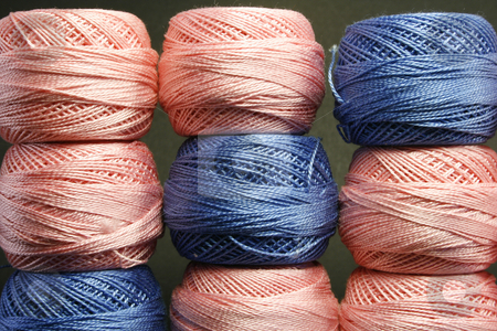 To use this stock image in your creative project, please select the size you need over to the right and click the "Add to Cart" button.
Your downloaded image will come with the Cutcaster watermark removed so don’t worry about the watermark you see on this page. Balls of thread stock photo, Close up of pink and blue balls of thread by Marina Magri