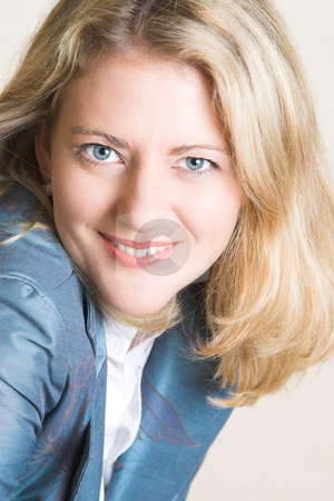 To use this stock image in your creative project, please select the size you need over to the right and click the "Add to Cart" button.
Your downloaded image will come with the Cutcaster watermark removed so don’t worry about the watermark you see on this page. Female Model stock photo, Beautiful Blond Adult Female model wearing a blue jacket by Carla Booysen