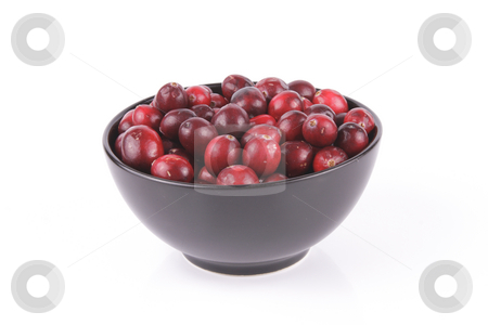 To use this stock image in your creative project, please select the size you need over to the right and click the "Add to Cart" button.
Your downloaded image will come with the Cutcaster watermark removed so don’t worry about the watermark you see on this page. Cranberries in a Black Bowl stock photo, Red ripe cranberries in a small round black bowl with a reflective white background by Keith Wilson