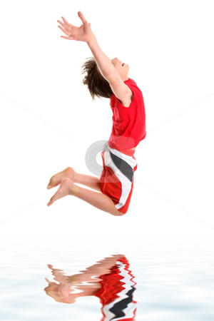 To use this stock image in your creative project, please select the size you need over to the right and click the "Add to Cart" button.
Your downloaded image will come with the Cutcaster watermark removed so don’t worry about the watermark you see on this page. Leaping child hands stretched to sky stock photo, A happy boy leaps mid jump with hands stretched towards the sky. by Leah-Anne Thompson