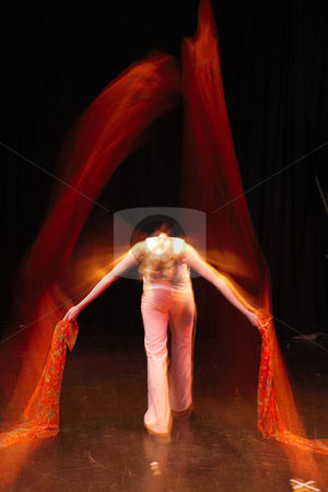 To use this stock image in your creative project, please select the size you need over to the right and click the "Add to Cart" button.
Your downloaded image will come with the Cutcaster watermark removed so don’t worry about the watermark you see on this page. Dancer on Stage stock photo, Single Caucasian female freestyle hip-hop dancer in a dancing training session. Lit with spotlights. Movement on edges of dancer by Sean Nel