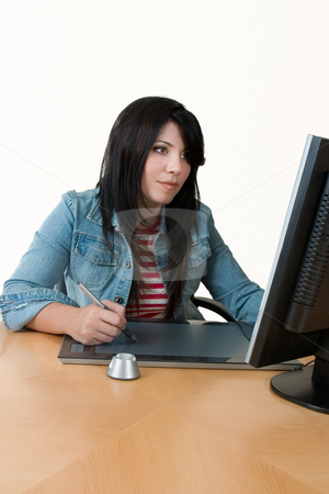 To use this stock image in your creative project, please select the size you need over to the right and click the "Add to Cart" button.
Your downloaded image will come with the Cutcaster watermark removed so don’t worry about the watermark you see on this page. Woman working at computer stock photo, A female worker at computer with graphic tablet. by Leah-Anne Thompson