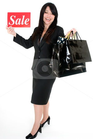 To use this stock image in your creative project, please select the size you need over to the right and click the "Add to Cart" button.
Your downloaded image will come with the Cutcaster watermark removed so don’t worry about the watermark you see on this page. Its Sale Time - Woman with shopping bags stock photo, An excited woman holding some boutique shopping bags. by Leah-Anne Thompson