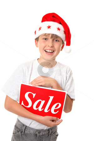 To use this stock image in your creative project, please select the size you need over to the right and click the "Add to Cart" button.
Your downloaded image will come with the Cutcaster watermark removed so don’t worry about the watermark you see on this page. Christmas Sale stock photo, Smiling joyful child holding a Sale Sign - pre or post Christmas sales by Leah-Anne Thompson