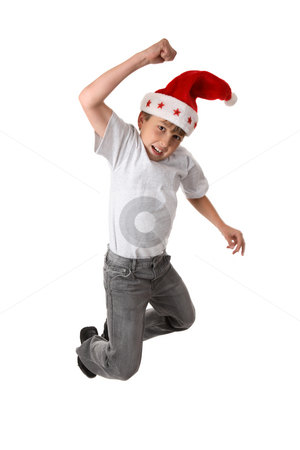 To use this stock image in your creative project, please select the size you need over to the right and click the "Add to Cart" button.
Your downloaded image will come with the Cutcaster watermark removed so don’t worry about the watermark you see on this page. Christmas Excitement stock photo, A smiling child leaps high into the air. Slight motion in fingers. by Leah-Anne Thompson