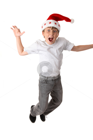 To use this stock image in your creative project, please select the size you need over to the right and click the "Add to Cart" button.
Your downloaded image will come with the Cutcaster watermark removed so don’t worry about the watermark you see on this page. Crazy Christmas stock photo, Excited crazy boy wearing a santa hat - motion in hand and feet. by Leah-Anne Thompson