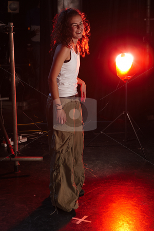 To use this stock image in your creative project, please select the size you need over to the right and click the "Add to Cart" button.
Your downloaded image will come with the Cutcaster watermark removed so don’t worry about the watermark you see on this page. Dancers on stage stock photo, A portrait of young female freestyle hip-hop dancer on stage. Lit with spotlights by Sean Nel