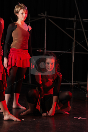 To use this stock image in your creative project, please select the size you need over to the right and click the "Add to Cart" button.
Your downloaded image will come with the Cutcaster watermark removed so don’t worry about the watermark you see on this page. Dancers on stage stock photo, A group of female freestyle hip-hop dancers in a dancing training session. Lit with spotlights by Sean Nel