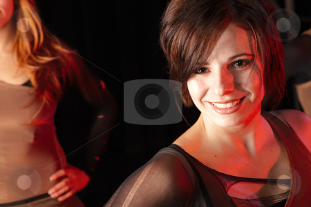 To use this stock image in your creative project, please select the size you need over to the right and click the "Add to Cart" button.
Your downloaded image will come with the Cutcaster watermark removed so don’t worry about the watermark you see on this page. Dancers on stage stock photo, A young female freestyle hip-hop dancers in a dancing training session. Lit with spotlights by Sean Nel