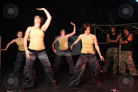 To use this stock image in your creative project, please select the size you need over to the right and click the "Add to Cart" button.
Your downloaded image will come with the Cutcaster watermark removed so don’t worry about the watermark you see on this page. Dancers on stage stock photo, A group of four female and two male freestyle hip-hop dancers during dance training session on stage. Lit with spotlights by Sean Nel