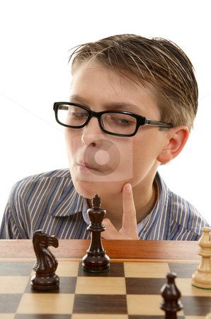 To use this stock image in your creative project, please select the size you need over to the right and click the "Add to Cart" button.
Your downloaded image will come with the Cutcaster watermark removed so don’t worry about the watermark you see on this page. Chess player analyzing next move stock photo, A young chess player considering or thinking carefully about his next tactical move by Leah-Anne Thompson