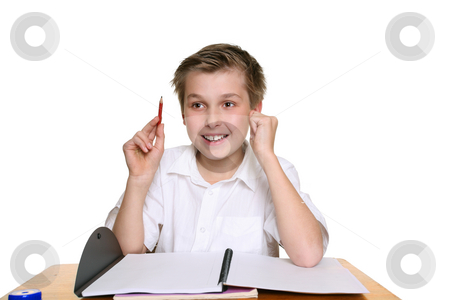 To use this stock image in your creative project, please select the size you need over to the right and click the "Add to Cart" button.
Your downloaded image will come with the Cutcaster watermark removed so don’t worry about the watermark you see on this page. Bright happy school boy stock photo, Happy school student sitting at desk with an idea or answer by Leah-Anne Thompson