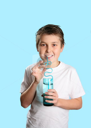 To use this stock image in your creative project, please select the size you need over to the right and click the "Add to Cart" button.
Your downloaded image will come with the Cutcaster watermark removed so don’t worry about the watermark you see on this page. Boy with glass of water stock photo, Boy holding a glass tumbler of water by Leah-Anne Thompson