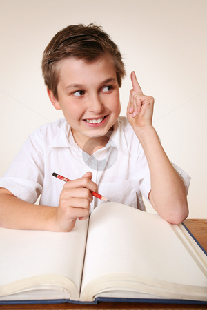 To use this stock image in your creative project, please select the size you need over to the right and click the "Add to Cart" button.
Your downloaded image will come with the Cutcaster watermark removed so don’t worry about the watermark you see on this page. Brainchild schoolboy with idea stock photo, Student school boy sitting at desk with school books has an inspirational idea by Leah-Anne Thompson