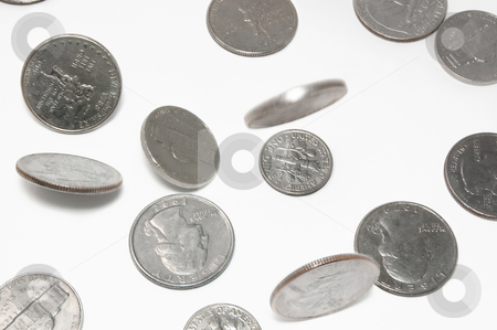 To use this stock image in your creative project, please select the size you need over to the right and click the "Add to Cart" button.
Your downloaded image will come with the Cutcaster watermark removed so don’t worry about the watermark you see on this page. Falling US coins on isolated background stock photo, Change falling on white background. Dimes and quarters. All in focus with slight motion blur by Pavel Filippov