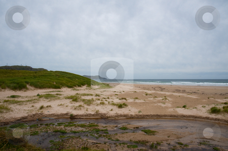 To use this stock image in your creative project, please select the size you need over to the right and click the "Add to Cart" button.
Your downloaded image will come with the Cutcaster watermark removed so don’t worry about the watermark you see on this page. Islay beach stock photo, Beach on the Isle of Islay by Jaime Pharr
