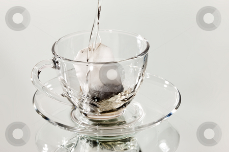 To use this stock image in your creative project, please select the size you need over to the right and click the "Add to Cart" button.
Your downloaded image will come with the Cutcaster watermark removed so don’t worry about the watermark you see on this page. Tea stock photo, Drink series: hot water pour into glassy teacup by Gennady Kravetsky