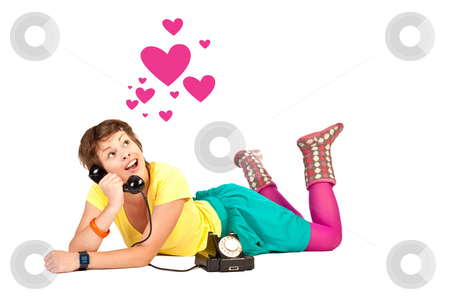 To use this stock image in your creative project, please select the size you need over to the right and click the "Add to Cart" button.
Your downloaded image will come with the Cutcaster watermark removed so don’t worry about the watermark you see on this page. Loving girl stock photo, People series: young girl in bright clothes speak on phone by Gennady Kravetsky