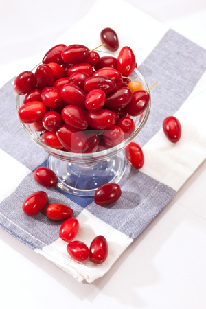 To use this stock image in your creative project, please select the size you need over to the right and click the "Add to Cart" button.
Your downloaded image will come with the Cutcaster watermark removed so don’t worry about the watermark you see on this page. Cornelian cherries stock photo, Food series: glasssy bowl with ripe Cornelian cherries by Gennady Kravetsky
