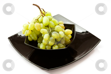 To use this stock image in your creative project, please select the size you need over to the right and click the "Add to Cart" button.
Your downloaded image will come with the Cutcaster watermark removed so don’t worry about the watermark you see on this page. Grapes stock photo, Food series: black plate with green grapes by Gennady Kravetsky