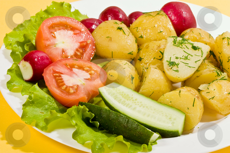 To use this stock image in your creative project, please select the size you need over to the right and click the "Add to Cart" button.
Your downloaded image will come with the Cutcaster watermark removed so don’t worry about the watermark you see on this page. Boiled potatoes stock photo, Food series: tasty boiled potatoes with tomato, radish and lettuce by Gennady Kravetsky