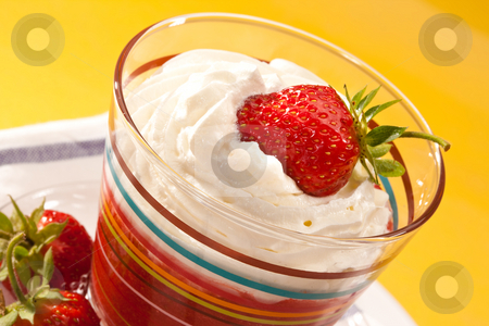 To use this stock image in your creative project, please select the size you need over to the right and click the "Add to Cart" button.
Your downloaded image will come with the Cutcaster watermark removed so don’t worry about the watermark you see on this page. Strawberry dish stock photo, Food series: strawberry with whipped cream in glassy bowl by Gennady Kravetsky
