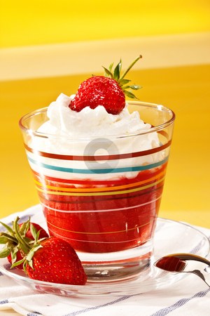 To use this stock image in your creative project, please select the size you need over to the right and click the "Add to Cart" button.
Your downloaded image will come with the Cutcaster watermark removed so don’t worry about the watermark you see on this page. Strawberry dish stock photo, Food series: strawberry with whipped cream in glassy bowl by Gennady Kravetsky