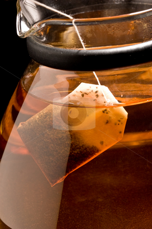 To use this stock image in your creative project, please select the size you need over to the right and click the "Add to Cart" button.
Your downloaded image will come with the Cutcaster watermark removed so don’t worry about the watermark you see on this page. Brewing of tea stock photo, Drink series: brewing (of black tea in the pot by Gennady Kravetsky