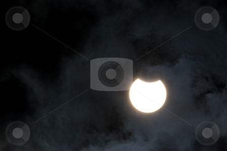 To use this stock image in your creative project, please select the size you need over to the right and click the "Add to Cart" button.
Your downloaded image will come with the Cutcaster watermark removed so don’t worry about the watermark you see on this page. Solar eclipse stock photo, Nature series: solar eclipse in summer day by Gennady Kravetsky
