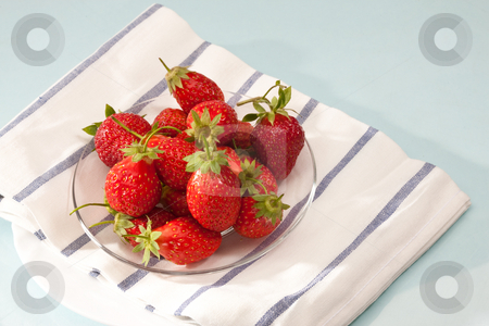 To use this stock image in your creative project, please select the size you need over to the right and click the "Add to Cart" button.
Your downloaded image will come with the Cutcaster watermark removed so don’t worry about the watermark you see on this page. Strawberry stock photo, Food series: red strawberry on the glassy plate by Gennady Kravetsky