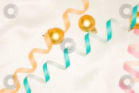 To use this stock image in your creative project, please select the size you need over to the right and click the "Add to Cart" button.
Your downloaded image will come with the Cutcaster watermark removed so don’t worry about the watermark you see on this page. Christmas decoration stock photo, Holiday series: Christmas golden ball decoration and streamer by Gennady Kravetsky
