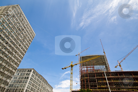 To use this stock image in your creative project, please select the size you need over to the right and click the "Add to Cart" button.
Your downloaded image will come with the Cutcaster watermark removed so don’t worry about the watermark you see on this page. Bulding stock photo, Construction series: new site of a modern building by Gennady Kravetsky
