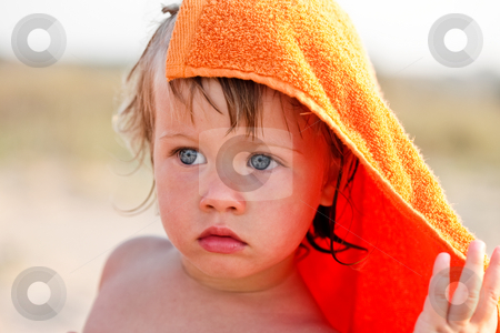 To use this stock image in your creative project, please select the size you need over to the right and click the "Add to Cart" button.
Your downloaded image will come with the Cutcaster watermark removed so don’t worry about the watermark you see on this page. Little girle stock photo, People series: portrait of little girl in orange towel by Gennady Kravetsky