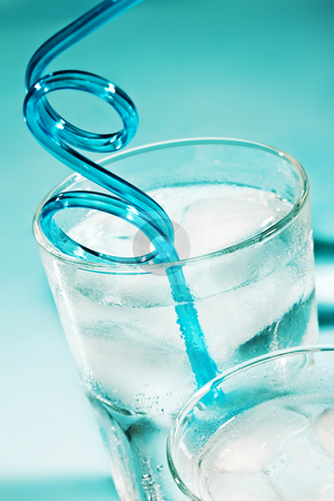 To use this stock image in your creative project, please select the size you need over to the right and click the "Add to Cart" button.
Your downloaded image will come with the Cutcaster watermark removed so don’t worry about the watermark you see on this page. Cold beverage stock photo, Drink series: glass of water with ice and tubule by Gennady Kravetsky